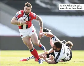  ??  ?? Andy Ackers breaks away from Lee Jewitt