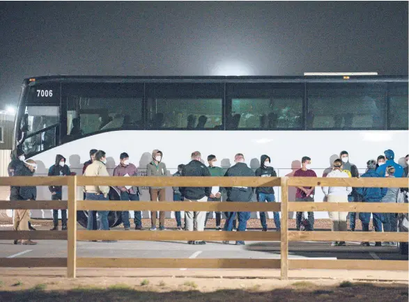  ?? ELI HARTMAN/ODESSA AMERICAN ?? Migrant children and teens are processed after entering a holding facility near Midland, Texas.