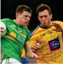  ??  ?? ON THE RUN: Leitrim’s Aidan Flynn takes on Conor Devaney