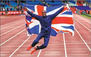  ?? ANDREW BOYERS / ACTION IMAGES VIA REUTERS ?? Britain's Mo Farah celebrates winning the 3,000m in his last track race at the IAAF Diamond League meet in Birmingham, England on Sunday.