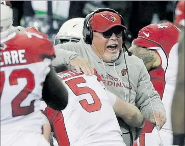  ?? Elaine Thompson Associated Press ?? BRUCE ARIANS, shown moments after a Cardinals victory Sunday, retired Monday as the winningest coach in Arizona history. “It’s been a great ride,” said Arians, who guided the team to the NFC title game in 2015.