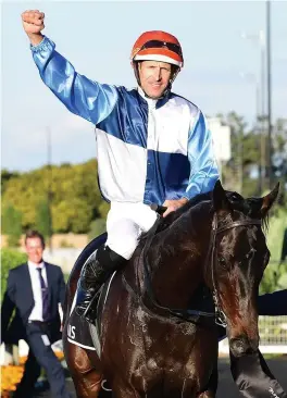  ??  ?? Duais, ridden by Hugh Bowman, after winning the Group 1 Queensland Oaks for Ed Cummings.
Picture: Grant Peters/Trackside Photograph­y,