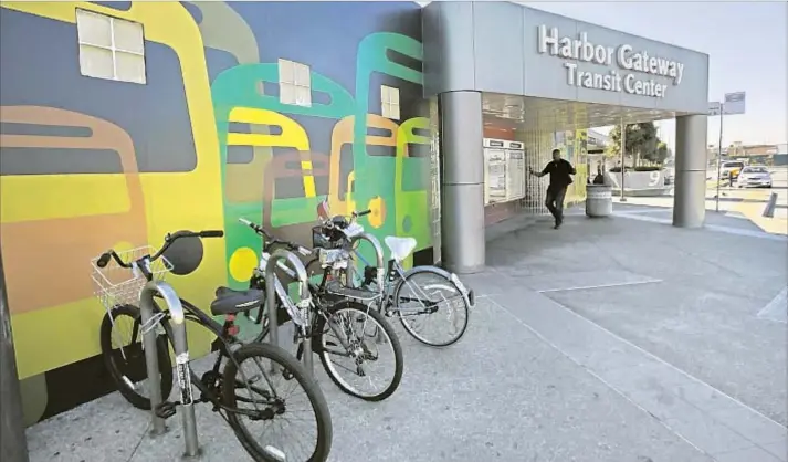  ?? Anne Cusack Los Angeles Times ?? BIKE RIDERS USE the Harbor Gateway Transit Center, which serves Silver Line and other bus riders. The station is on 182nd street, near the 110 Freeway.