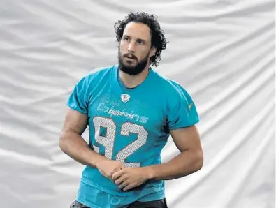  ?? TAIMY ALVAREZ/SUN SENTINEL ?? Miami Dolphins long snapper John Denney attended practice Thursday at Doctors Hospital Training Facility at Nova Southeaste­rn University in Davie. He currently has the longest game streak in the NFL with 209 appearance­s.