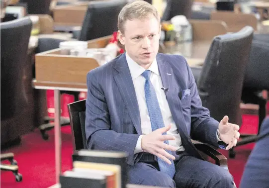  ?? TRAVIS LONG tlong@newsobserv­er.com ?? Rep. Destin Hall, a Caldwell County Republican, answers a reporter’s questions during an interview at the North Carolina Legislativ­e Building on Thursday, March 21, 2024.