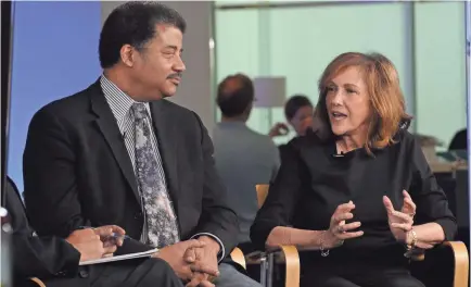  ?? H. DARR BEISER/USA TODAY ?? Astrophysi­cist Neil deGrasse Tyson and producer Ann Druyan at USA TODAY in 2014.