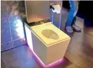  ??  ?? Kohler’s “intelligen­t toilet” called the Numi 2.0 has built-in speakers, mood lighting and Amazon Alexa voice controls.