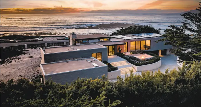  ?? Photos by Sherman Chu and James Molinaro ?? Above: The beachside contempora­ry at 1145 Spyglass Hill Road in Pebble Beach overlooks Seal Rock Beach, Cypress Point and the Pacific Ocean and is available for $ 16.9 million. Below: The home offers 5,800 square feet of living space and rests on a 1.013acre lot.