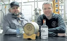  ?? RAY SPITERI/NIAGARA FALLS REVIEW ?? Chris Jeffries and Andrew Murison, of Niagara Falls Craft Distillers, are excited to open their new venture to the public Friday.