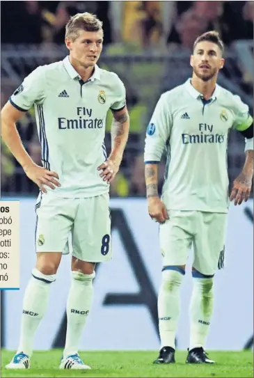  ??  ?? SIN EL ‘PANZER’ BRASILEÑO. Kroos y Ramos, cariaconte­cidos tras el primer gol del Borussia.