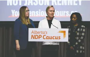  ?? GREG SOUTHAM ?? NDP labour critic Christina Gray, left, said Wednesday she will introduce a private member’s legislatio­n this spring to protect and strengthen Albertans’ pension rights. She is speaking with retired teacher Tim White, centre, and Melissa Alexander, who works at Grey Nuns Community Hospital.