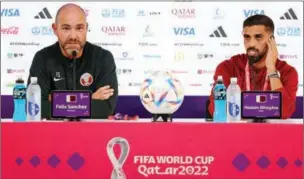  ?? (AFP) ?? Qatar’s Spanish coach Felix Sanchez (L) and Qatar’s forward Hassan Al Haydos attend a press conference at the Qatar National Convention Center (QNCC) in Doha on the eve of the FIFA World Cup Qatar 2022 opening against Ecuador.