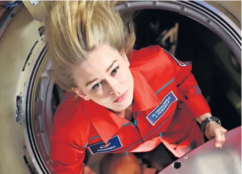  ?? ?? Yulia Peresild stars in The Challenge, about a doctor who has to fly into space to save a cosmonaut. Twelve days of filming took place on board the Internatio­nal Space Station