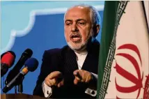  ?? VAHID SALEMI/ASSOCIATED PRESS ?? Iran’s Foreign Minister Mohammad Javad Zarif addresses a conference in Tehran, Iran, on Tuesday. He later told journalist­s the country has started implementi­ng a law to curb U.N. inspection­s into its nuclear program.