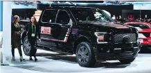  ?? FREDERIC J. BROWN/AFP/GETTY IMAGES ?? Motor Trend magazine’s 2018 Truck of the Year was the Ford F-150 Lariat Truck. Ford is planning to enhance its vehicles including the F-150 pickup line to boost its market share.