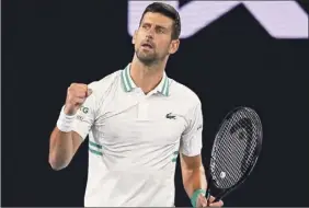  ?? William West / Getty Images ?? Top seed Novak Djokovic revealed a pain in his torso after his third-round victory at the Australian Open, then clammed up about his injury.