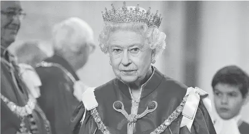  ??  ?? When the Queen dies, staff of Canada’s governor general, lieutenant-governors and territoria­l commission­ers will be issued black ties and armbands. GEOFF PUGH - WPA POOL /GETTY IMAGES FILES