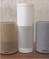  ?? ELAINE THOMPSON/ AP ?? An Amazon Echo Plus ( center) and other Echo devices sit on display last year during an event announcing several new Amazon products by the company in Seattle. Amazon says an "unlikely" string of events prompted an Echo device to record a family's...