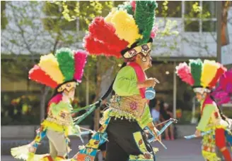  ?? Photos by Helen H. Richardson, The Denver Post ?? Dancers with Danza Matachina Guadalupan­a perform Sunday outside the Denver Art Museum during the Día del Niño celebratio­n.