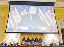  ?? SUSAN WALSH AP ?? A video exhibit featuring former President Donald Trump and his claims about the 2020 presidenti­al election is displayed during the panel’s public hearing Monday at the U.S. Capitol.