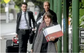  ?? KEVIN STENT/STUFF ?? Deborah Manning, front, arrives for the hearing with Simon Lamain, back left, and Hit and Run journalist Nicky Hager.