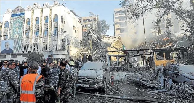  ?? AFP ?? El bombardeo destruyó por completo uno de los edificios diplomátic­os de Irán en la capital siria.