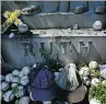  ?? THE ASSOCIATED PRESS ?? Fans still leave bats, balls, beer and other items on Babe Ruth’s grave in Hawthorne, N.Y.