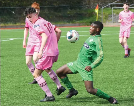  ?? Photo by Domnick Walsh ?? Kerry’s Junior Anhomah Kerry and Darragh Levo, Wexford, in action during the U-17 Airtricity Soccer League played at Mounthawk Park, Tralee. LEFT: Kerry’s John Carmody in action against Wexford’s Kyle Scallan