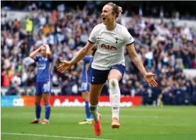  ?? Photograph: John Sibley/Action Images/Reuters ?? Tottenham’s Martha Thomas wheels away in celebratio­n after her header won the tie with two minutes of extra time remaining.