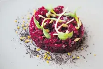  ??  ?? A timbale of smoked beet tartare with miso and bee pollen.