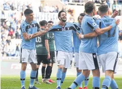  ?? REUTERS ?? Lazio players celebrate a goal during a Serie A match last month.