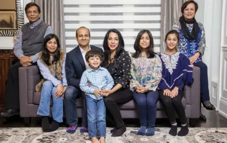  ?? CARLOS OSORIO/TORONTO STAR ?? Haniya Sheikh, centre, and her husband Samir Khan, third from left, are second-generation immigrants, with their children and Sheikh’s parents.