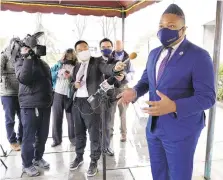  ?? MATTSLOCUM/AP ?? State Rep. Malcolm Kenyatta, D-Philadelph­ia, an Electoral College member, speaks to the media outside of The Forum near the Pennsylvan­ia state Capitol after voting in the 2020 presidenti­al contest Monday. Pennsylvan­ia cast its 20 electoral votes for Democrat Joe Biden.