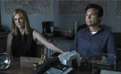  ?? JACKSON DAVIS, THE ASSOCIATED PRESS ?? Laura Linney, left, and Jason Bateman in a scene from the Netflix series “Ozark.”