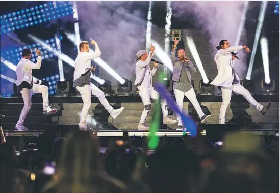  ?? Photograph­s by Gina Ferazzi Los Angeles Times ?? WHO’S NO. 1? Why, the Backstreet Boys, of course. Missed them at Wango Tango? The boy band can be seen regularly in Las Vegas, as a member noted during the set.