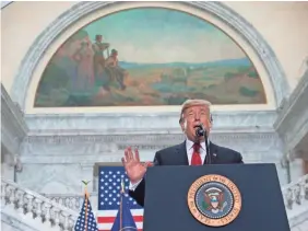  ??  ?? President Trump says previous administra­tions oversteppe­d their powers when designatin­g land as national monuments. SAUL LOEB/AFP/GETTY IMAGES