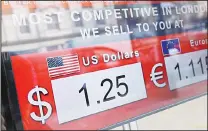  ??  ?? A screen in a currency exchange showing the latest tourist rates for the British pound sterling against the United States dollar, in central London on Oct 4. The British pound has hit a 31-year low against the dollar amid concern the country is willing...