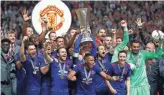  ?? ODD ANDERSEN, AFP/GETTY IMAGES ?? Manchester United players celebrate after beating Ajax in the UEFA Europa League final.