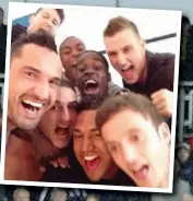  ??  ?? PICTURE THIS: Leicester players celebrate their promotion to the Premier League yesterday with a selfie