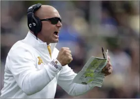  ?? MICHAEL CONROY - THE ASSOCIATED PRESS ?? FILE - In this Sept. 28, 2019, file photo, Minnesota head coach P.J. Fleck celebrates a touchdown during the first half of an NCAA college football game against Purdue in West Lafayette, Ind.