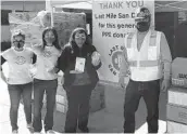  ?? COURTESY CITY OF OCEANSIDE ?? Mayor Esther Sanchez (center) accepts donations of personal protective equipment from representa­tives of Last Mile San Diego and Teamsters Local 542.