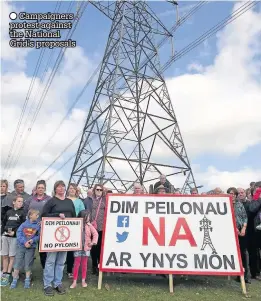  ??  ?? Campaigner­s protest against the National Grid’s proposals