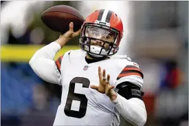  ?? STEVEN SENNE / ASSOCIATED PRESS ?? Walking proved to be difficult for Baker Mayfield earlier this week, but the Browns starting quarterbac­k returned to practice Thursday.