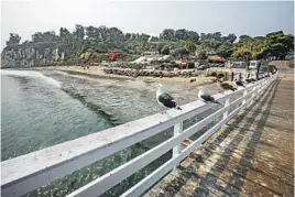  ?? Los Angeles Times ?? Ricardo DeAratanha
HIT THE BEACH at La Jolla Cove, top, Crystal Cove, far left, or the Strand, bottom far left; visit the Santa Barbara Zoo, left center; check out the view from the pier at Paradise Cove, above; or stop by the Korean Friendship Bell, left, at Angels Gate Park in San Pedro. All are within a few hours of downtown Los Angeles.