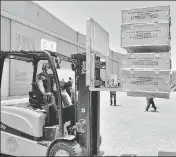  ?? REUTERS ?? A driver loads the medical supplies, which will be sent to India, at the Internatio­nal Humanitari­an City in Dubai on Sunday.