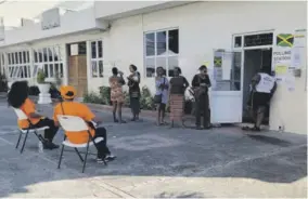  ?? (Photo: Karl Mclarty) ?? A handful of voters at a polling station during the February 26, 2024 Local Government Elections.