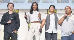  ?? ALBERTO E. RODRIGUEZ, GETTY IMAGES, FOR DISNEY ?? The gang ’s all here: Holland and his co- stars Laura Harrier, Tony Revolori and Jacob Batalon attend Comic- Con in July.