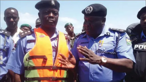  ??  ?? The Officer-in-Charge of Marine Command, DSP Ben Ogungbure, and the immediate past Assistant Inspector General of Police, Marine Police Command, Muhammed Katsina, at the police jetty