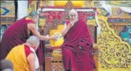  ?? AP PHOTO ?? Spiritual leader The Dalai Lama eats traditiona­l Tibetan cookies upon arrival in Tawang, Arunachal Pradesh, on Friday.