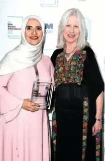  ?? ?? JOKHA ALHARTHI and Marilyn Booth, her translator, after they won the Internatio­nal Man Booker Prize for Celestial Bodies, in London on May 21, 2019. The book was the first-ever winner from an Arab country and was in fact the first novel by an Omani woman writer to be translated into English at all.